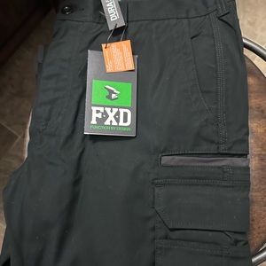 Black FXD work pants with tags on.